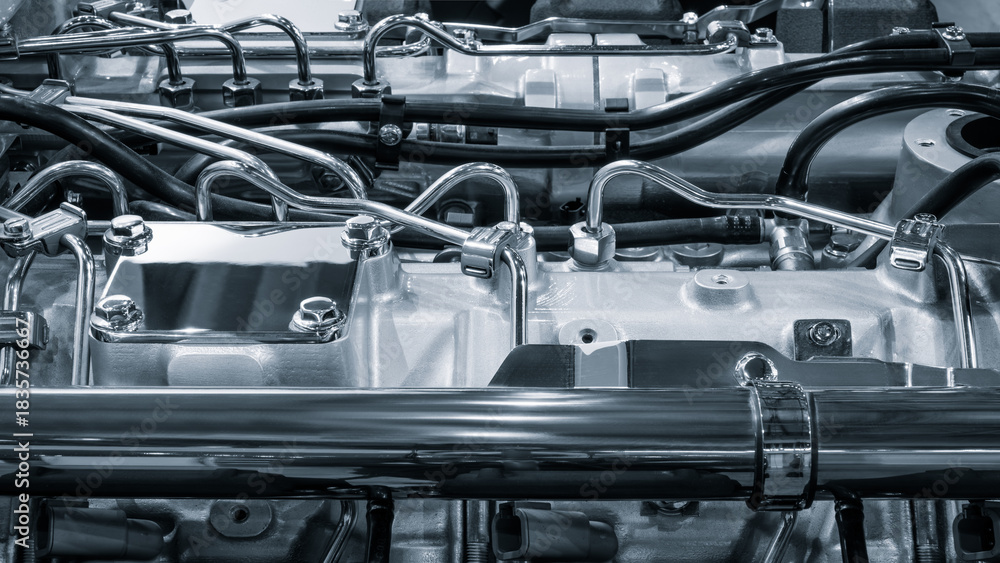 Fototapeta premium Beautiful stainless steel new shiny car or truck engine, industrial transport concept background.