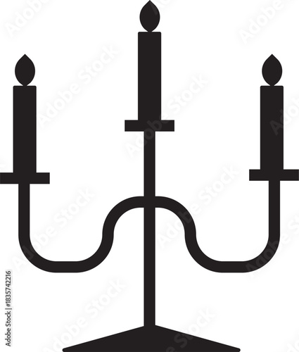 Vintage candelabra silhouette with three lit candles