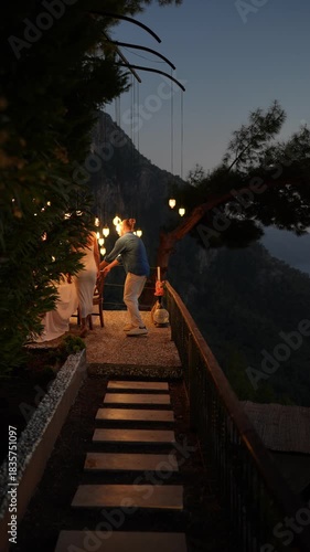 A couple enjoying a romantic dinner together in a warm and intimate atmosphere, capturing love, connection, and elegant holiday dining moments.