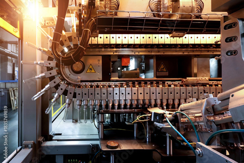 Photos Automated PET plastic bottle blow molding machine