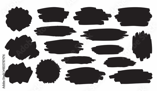 A versatile collection of black watercolor brush strokes isolated on a white background. Set of hand-painted ink textures, banners, and abstract grunge design elements.