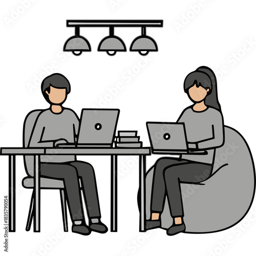 Two Colleagues Working Together on Laptops in a Modern Office Setting Under Overhead Pendant Lights Sitting at a Desk and a Beanbag Chair