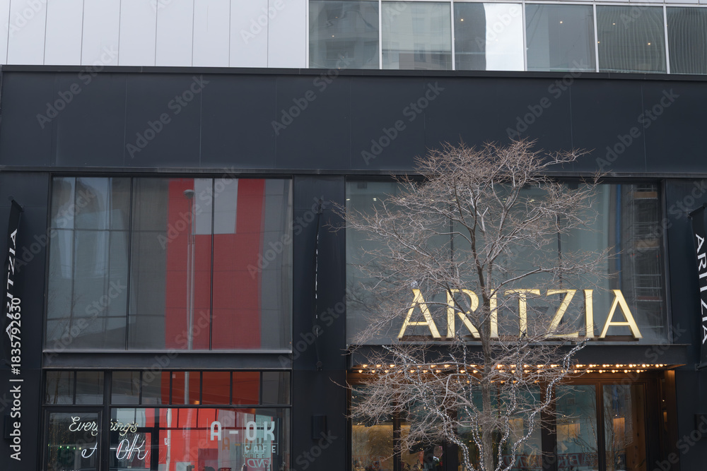 Fototapeta premium facade and sign of Aritzia, a women's clothing store, located at 50 Bloor St W, Holt Renfrew Centre, Toronto