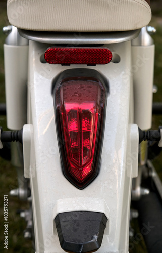 Close-up of the headlights of a vintage motorcycle.