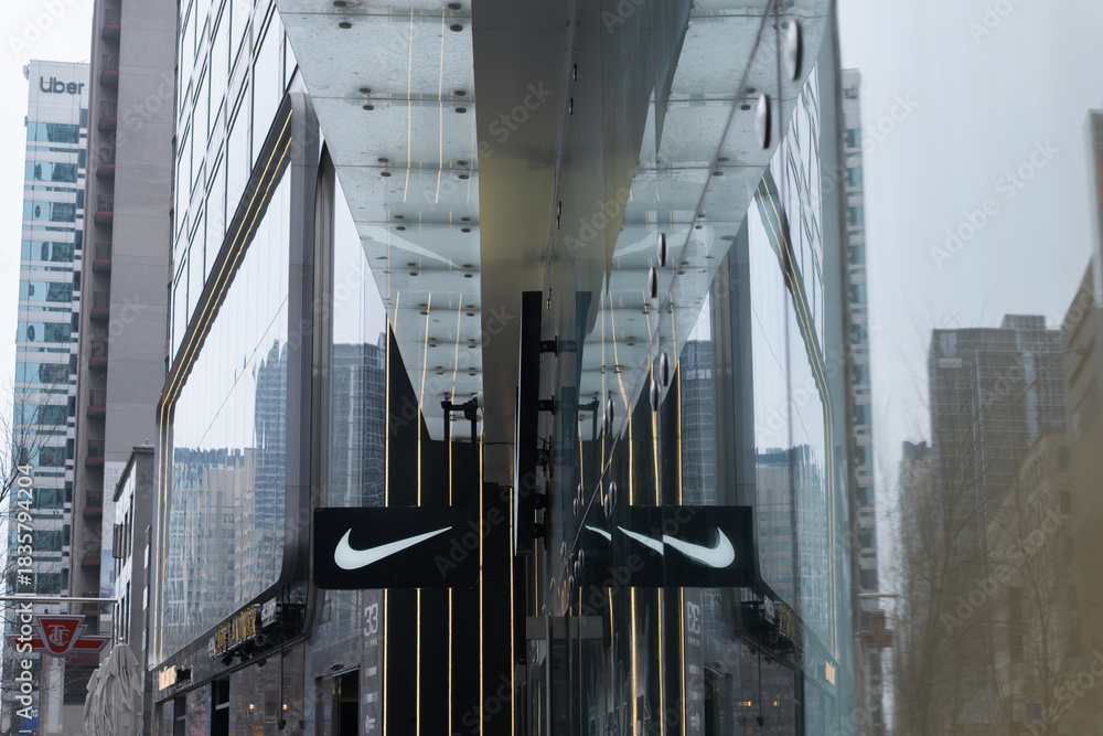 Fototapeta premium abstract projecting sign of Nike Bloor, a sportswear store, located at 23 Bloor St E, Toronto