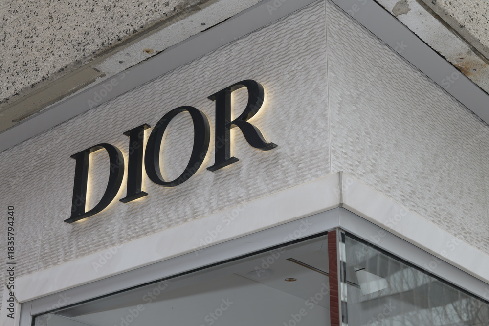 Fototapeta premium sign on exterior of DIOR, a clothing store, located at 131 Bloor St W, floor 1, The Colonnade, Toronto