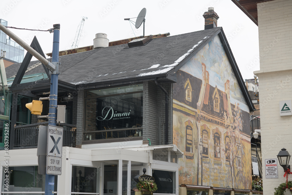 Fototapeta premium exterior of Dimmi Bar & Trattoria located at 140 Cumberland St, Toronto