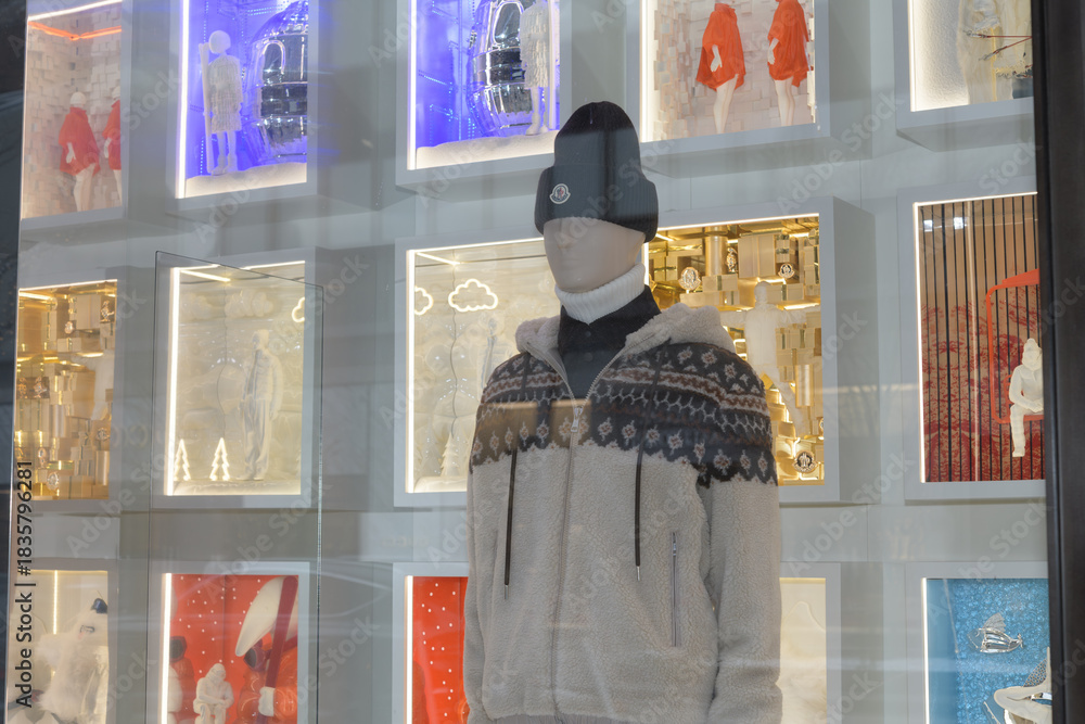 Fototapeta premium display window with mannequin inside Moncler, a clothing store, located at 131 Bloor St W, Toronto