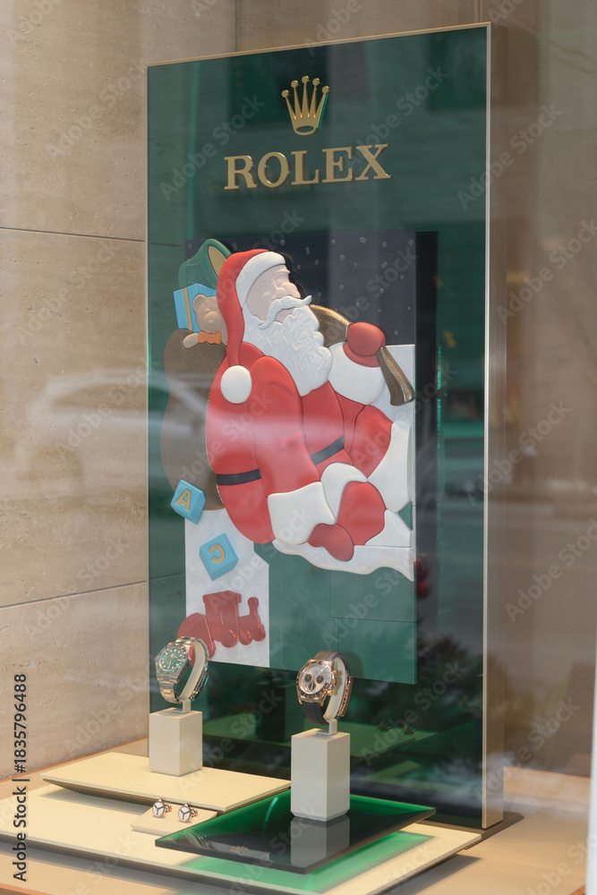 Fototapeta premium hand‑crafted holiday display by Rolex’s Roldeco studio, featuring festive Santa Claus figure in leather and fabric at Rolex Boutique at Royal de Versailles Jewellers, 101 Bloor St W, Toronto