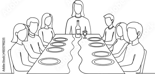 People gathered around a table with plates and a bottle of wine gathering dining