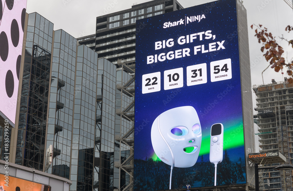 Naklejka premium digital billboard featuring ad for Shark and Ninja facing Sankofa Square, Toronto