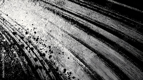 a striking contrast between black and white. on one side is an abstract black and white graphic, composed of lines and shapes that appear as if they could be textured paper or fabric