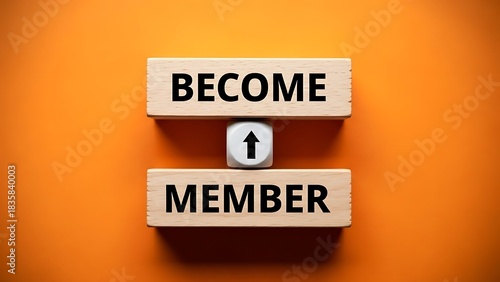 Wooden blocks spell out become member with arrow symbol