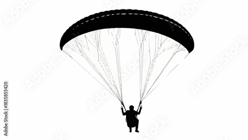 Black and white silhouette of a person paragliding.