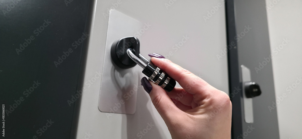 Naklejka premium A lock with a code mechanism. Protection of personal belongings using a lock with a code mechanism in lockers.