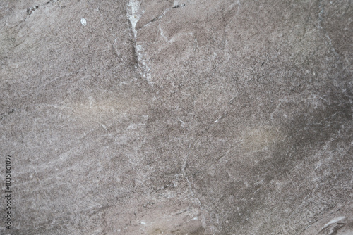 Rock surface with textured pattern in natural setting