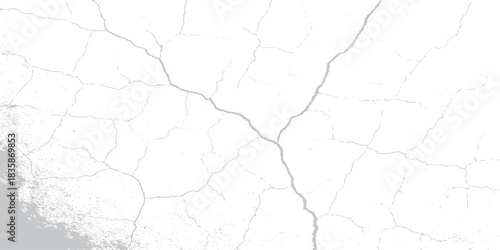 A grunge textured concrete wall shows an aged and cracked pattern on its dirty surface