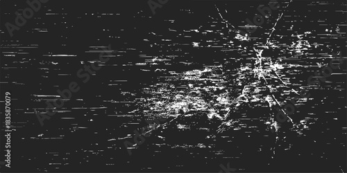 Black ink splash on an abstract grunge texture, like an old, dirty glass window surface hit by a cold blue wave