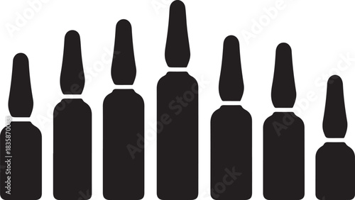 A collection of various shaped black bottles displayed in a horizontal row