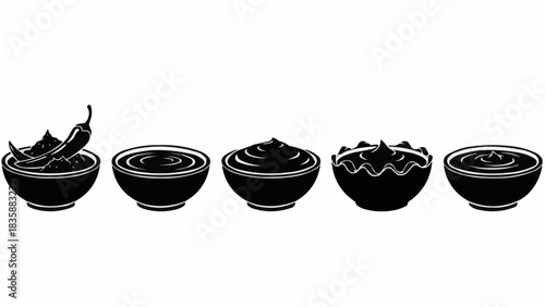 Five Bowls of Sauces and Condiments with Chili Peppers.