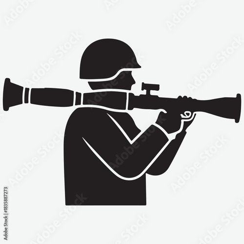 Silhouette of a soldier aiming a rocket-propelled grenade launcher