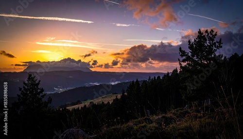 Sunset over a mountainous landscape