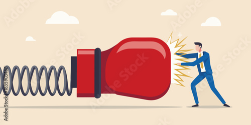 Businessman hit by a surprise boxing glove punch unexpected setback concept