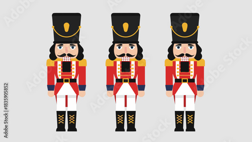 Three nutcrackers dressed in red uniforms with black hats stand side by side on a white background