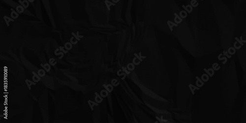 Black paper wrinkled texture for background space. Rough black paper. Paper texture, recycled creased paper background.	