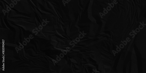 Black paper wrinkled texture for background space. Rough black paper. Paper texture, recycled creased paper background.	