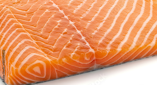 Fresh salmon fillet close-up shows vibrant color and rich texture, perfect for healthy recipes, gourmet food blogs and promoting seafood freshness