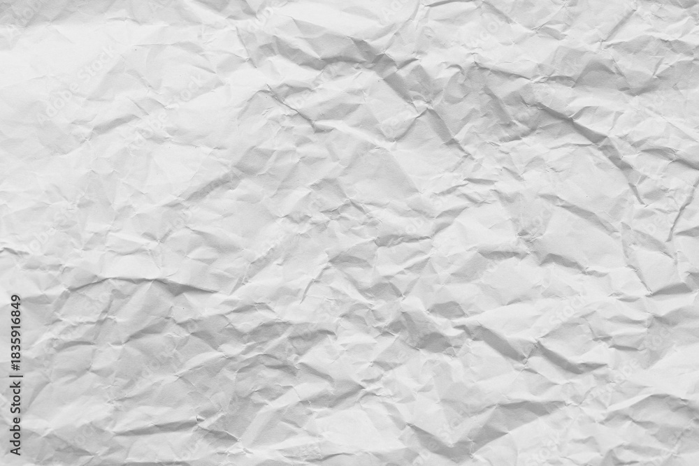 Fototapeta premium Crumpled white paper texture,isolated crumpled paper texture background,Crumpled paper texture. Realistic white crumpled paper background. Horizontal wrinkled empty notepad sheet. 