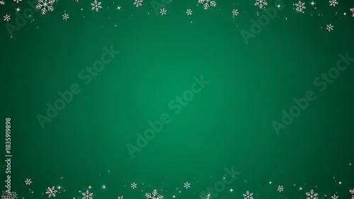 Festive holiday banner featuring shimmering snowflakes on a deep verdant Christmas backdrop for greetings