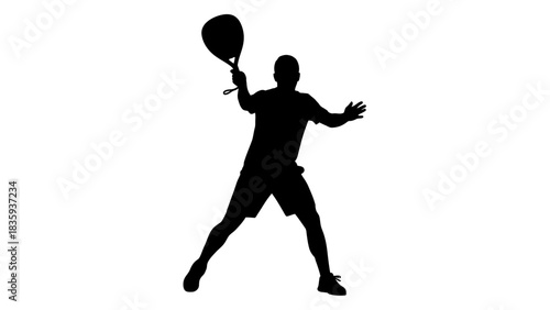 Silhouette of a man playing tennis with a racket.