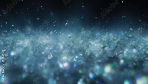 Abstract Blue Glitter Sparkle Background with Bokeh Effect.