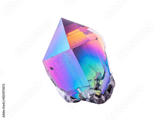 A faceted crystal displays vibrant, iridescent hues against a solid black background