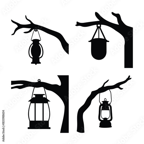 Vintage lantern silhouettes suspended from tree branches