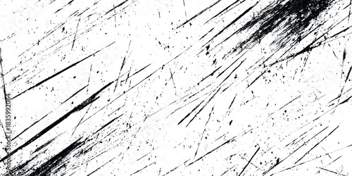 Grunge black ink splatter and scratched texture overlay on white background for design Perfect for use as a photographic overlay.