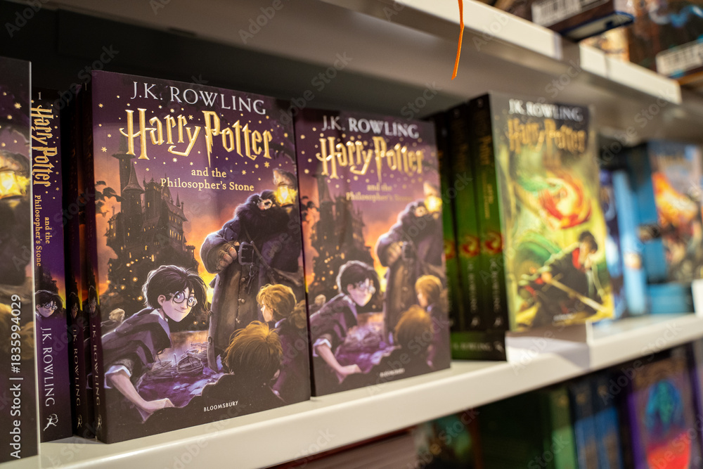 Obraz premium View of Harry Potter and the Philosopher's Stone books on store shelf. Toronto, Canada - December 3, 2025.