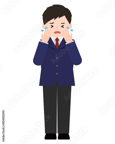 顔を覆って泣いている男の子