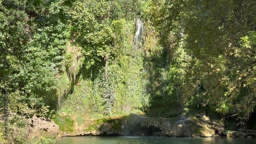 Waterfall lush greenery. High quality photo