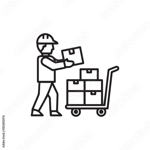 A worker in a hard hat loading boxes onto a hand truck.