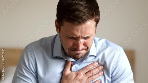 Man Experiencing Chest Pain, Gasping for Air, Feeling Discomfort, Health Concern, Distress