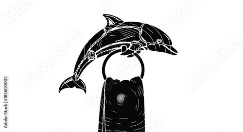 Whimsical dolphin-shaped towel rack holding a folded black towel