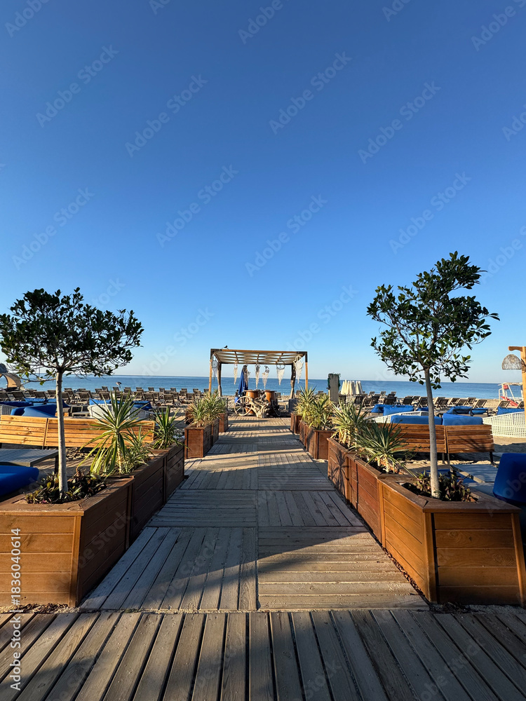 Fototapeta premium Beachfront wooden path. High quality photo