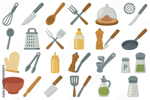 Kitchen utensils including whisks, knives, spoons, and jars arranged on a clean surface ready for cooking activities
