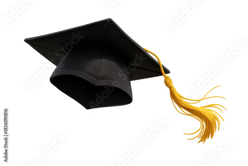 Wallpaper Mural Black graduation cap with a yellow tassel moving through the air, symbolizing academic achievement and future success Torontodigital.ca