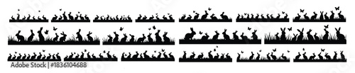 Black silhouette rabbits and butterflies in grass bunny