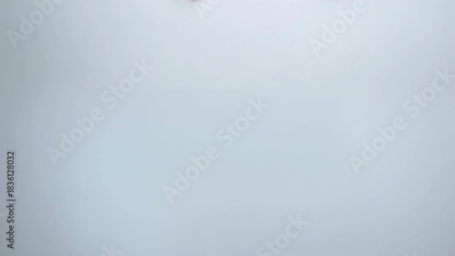 Happy Santa leans on large white banner with both hands visible above edge against green background creating bright christmas layout perfect for holiday web headers posters and cards