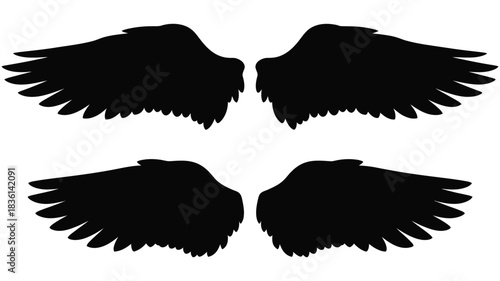 A pair of black wings depicted in a simple graphic style